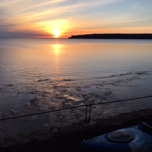 Evening skies glowing as the sun sets over Georgian Bay.