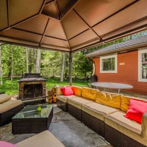 Enjoy the private outdoor lounge with wood burning fireplace.