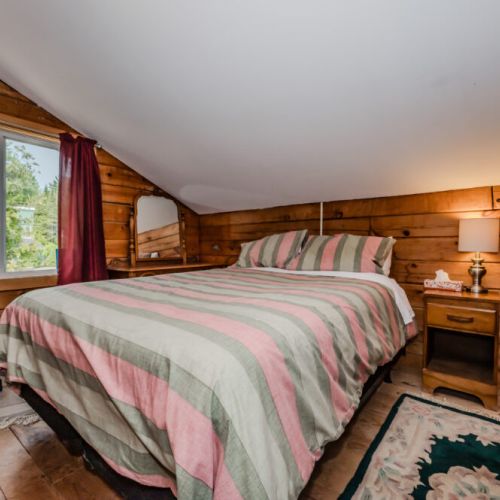 The third inviting bedroom is perfect for a peaceful night's sleep after a day of exploring the outdoors.