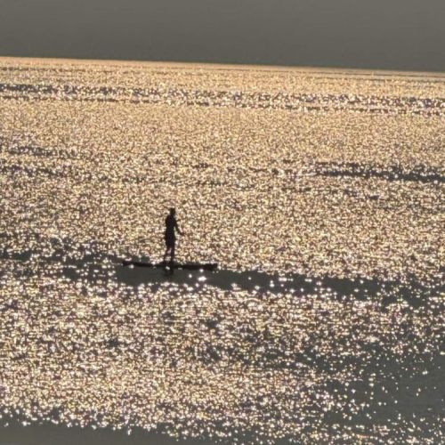 Paddle into serenity as the golden sun sparkles across the water—unwind and explore in ultimate tranquility.
