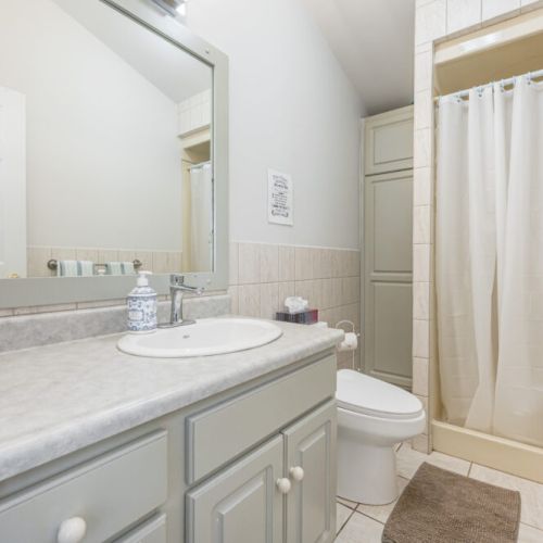 One of two full bathrooms.