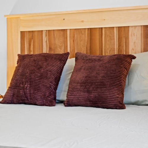 Soft linens and cozy bedding ensure a restful night's sleep.