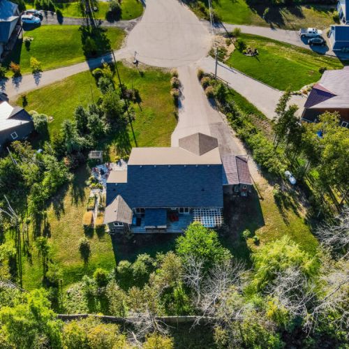 The Ace features a large and private estate lot surrounded by trees.