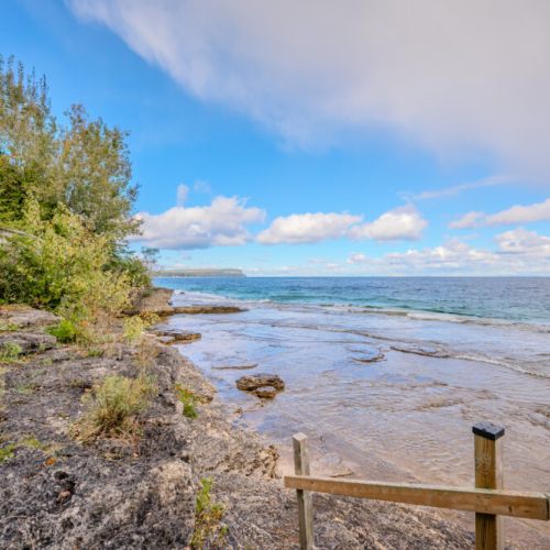 Private steps lead you directly to the calm, pristine waters of Georgian Bay. Ideal for morning dips or launching kayaks for an unforgettable adventure along the Bruce Peninsula.