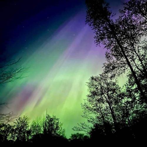 Experience the Northern Lights in their full splendor from our private, light-pollution-free location. This photo, taken by a neighbor on May 10, 2024, during the G5 Geomagnetic Storm, captures just a glimpse of what you may witness during your stay!