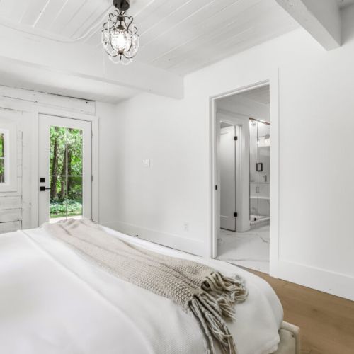 Wake up to quiet forest views with a short stroll to the nearby bathroom.