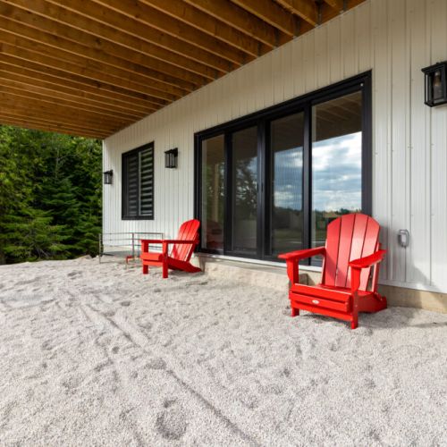 Step outside onto the covered patio and enjoy easy access to the waterfront.