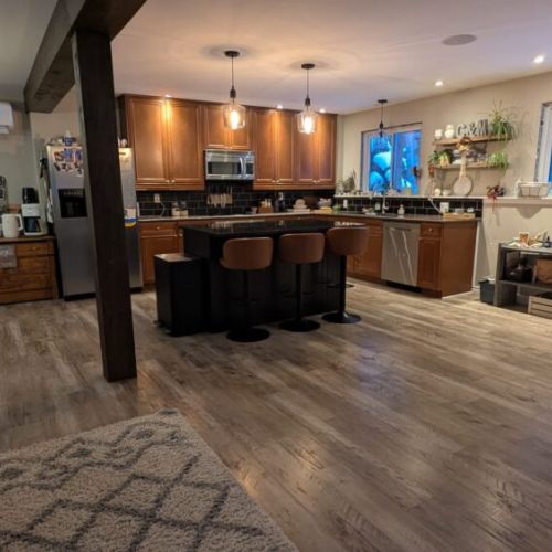 Bright, open-concept kitchen with large island and plenty of space for cooking, entertaining, and spending time together.