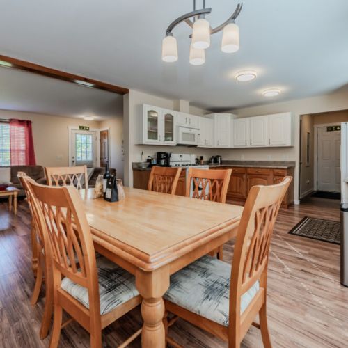 A seamless flow between the living room, dining area, and kitchen makes Maple Cottage ideal for entertaining and spending time with loved ones.