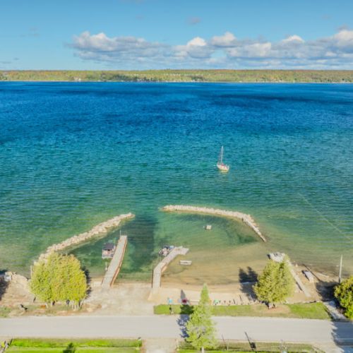 Waterfront dock area with easy lake access, providing guests a serene spot for boating or fishing.