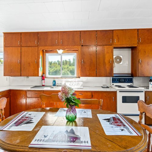 Enjoy the character of the original-style farmhouse kitchen and a dining area perfect for sharing meals together.
