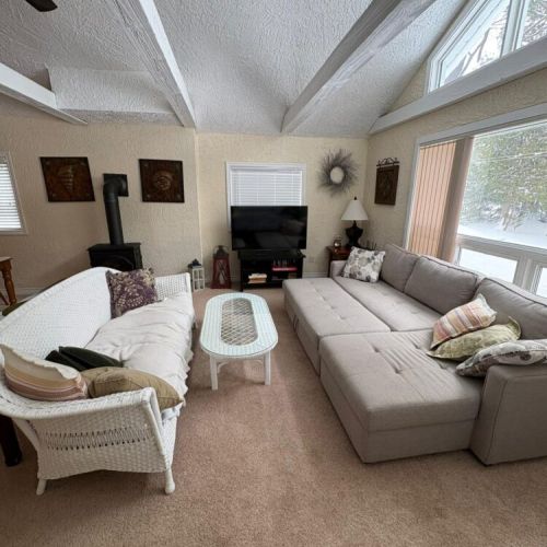 Spacious seating for movie nights, reading, or unwinding after a day at the beach.