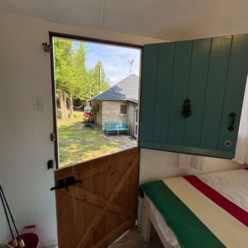 Open the charming half-door to fresh air and a peek at the main cottage.