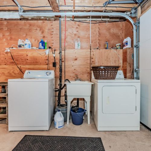 Convenient laundry facilities available in the cottage, making extended stays and family vacations by the lake even easier.