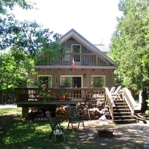 Bearfoot Lodge rests fully secluded on a private lot in the Cameron Lake - National Park Community.