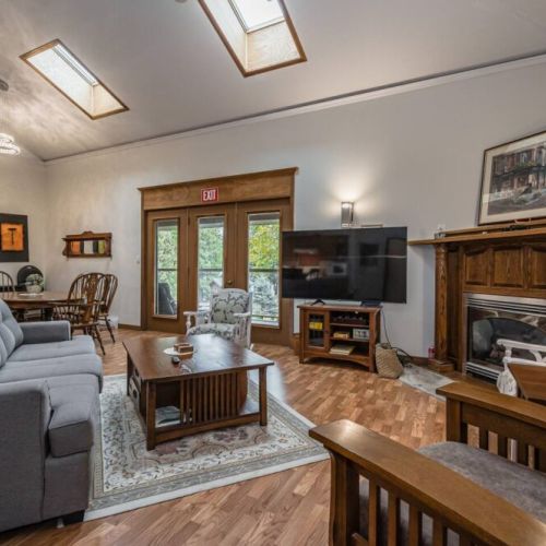 The large open concept living area exits to a massive wrap-around deck and lounge. The skylights are an incredible way to enjoy 1 of 12 UNESCO Dark Skies in Canada.