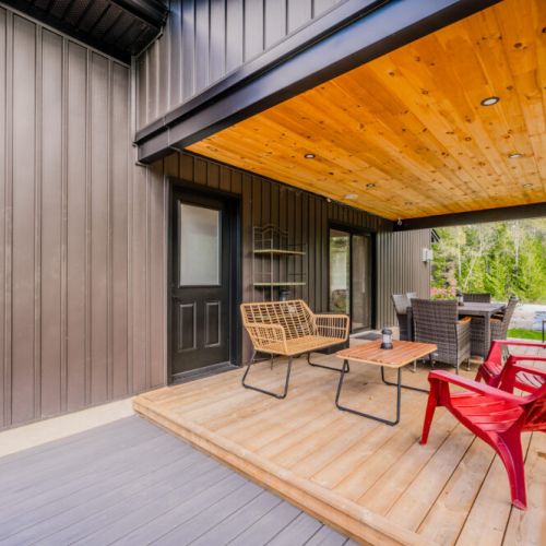 Gather around the back patio, a perfect spot for evening conversations and dining al fresco, surrounded by the peaceful sounds of nature.