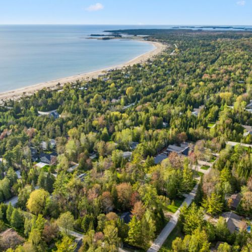 Located just a short walk from the shoreline, you'll enjoy easy access to one of the area's beautiful sandy beaches.