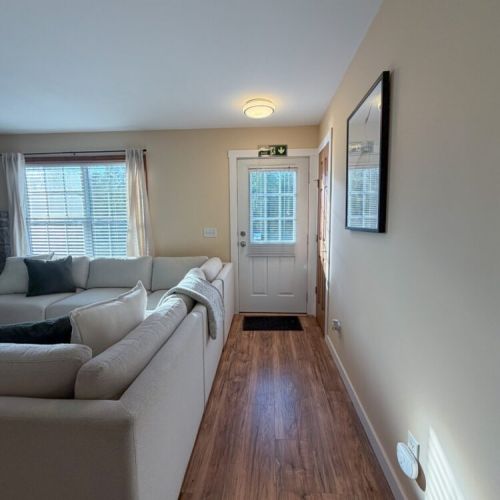 Step inside and unwind—this bright, cozy cottage welcomes you with comfortable living spaces, natural light, and a relaxing atmosphere.