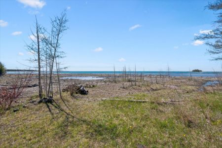 Enjoy direct access to the beautiful Lake Huron shoreline, where you'll find endless opportunities to explore, relax, and take in unforgettable sunsets.