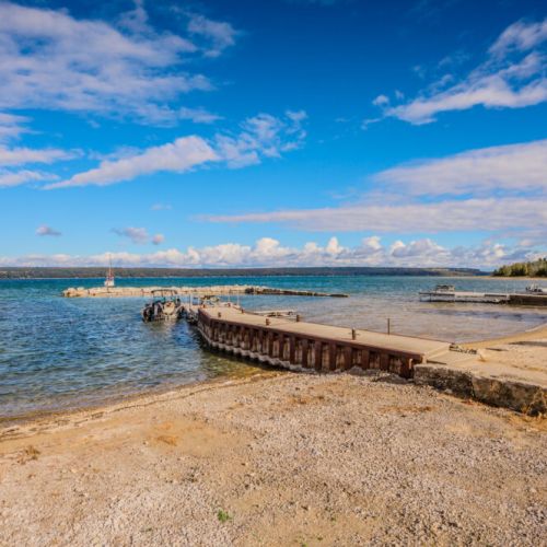 Comfortable seating along the shore, allowing guests to sit back and soak in the peaceful lakefront environment.