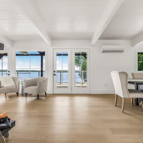 Wide open main floor with tons of natural light and easy access to the deck and water.