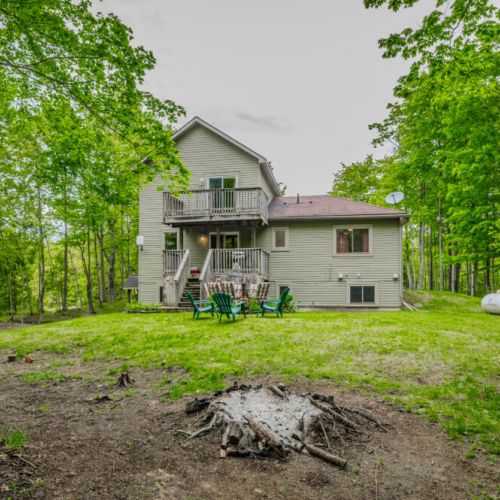 Gather around the fire pit for an evening of s'mores and storytelling, creating lasting memories in this picturesque woodland setting.