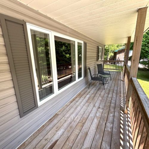 Two chairs, a small table, and plenty of fresh air—your ideal spot to unwind outdoors.