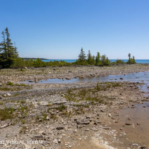 Explore the natural rocky shoreline and enjoy endless views of Georgian Bay’s crystal-clear water.