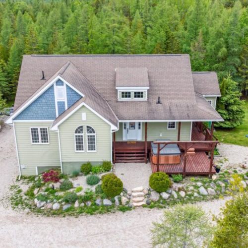 A stunning aerial view of Casa Giulia, tucked into a 16-acre private estate surrounded by lush Northern Ontario forest—your secluded luxury escape.