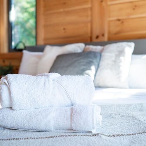 Fresh linens and fluffy towels welcome you for a restful night’s sleep.