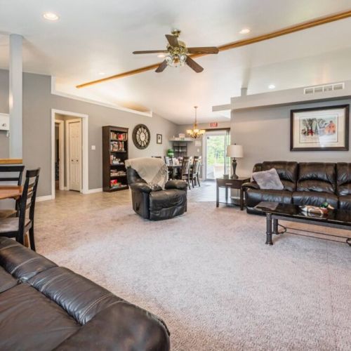 The spacious living room makes entertaining friends and family a breeze, or take a book to read or game off of the shelf to play in the reading nook.