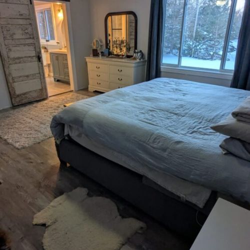 Bedroom 1: Spacious primary bedroom with comfortable bedding and calming décor for restful nights.