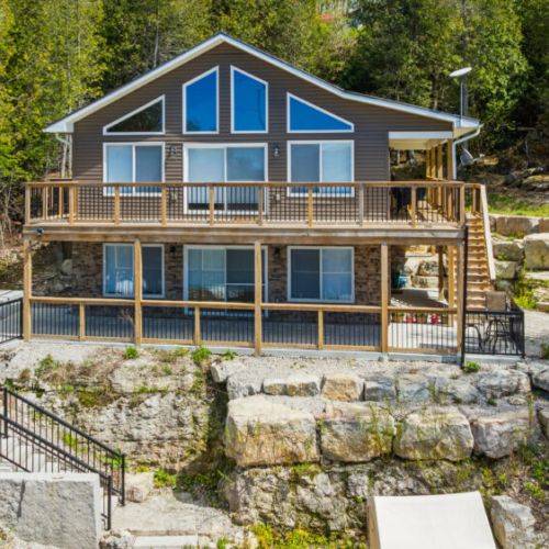 Where the woods meet the water. Cozy, modern, and completely surrounded by nature.