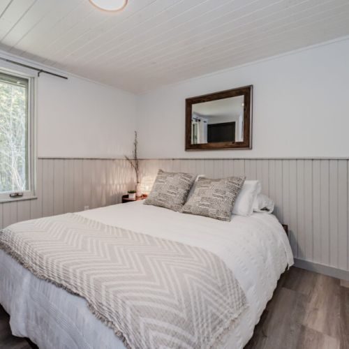 The Guest room, where soft textures and soothing tones create a haven of tranquility amidst the natural beauty outside your window.