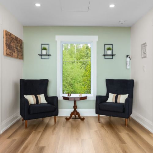 Enjoy a quiet reading nook, perfect for relaxing with a book or your morning coffee.