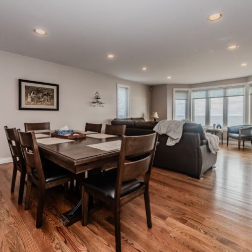 Enjoy meals together in the inviting dining area while taking in the breathtaking views of Georgian Bay. The serene setting complements any gathering, whether it’s a family dinner or a morning coffee before your next adventure.