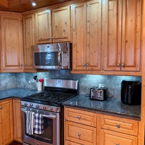 Cook delicious meals with modern appliances and rustic charm—perfect for family vacations, cozy getaways, and extended stays at your lakeside retreat.