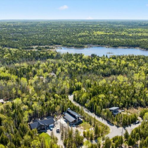 Surrounded by forests and nearby lakes, Cabin offers the perfect four-season escape.