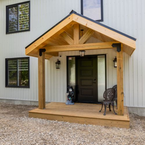 A welcoming front porch is the perfect place to arrive and unwind.