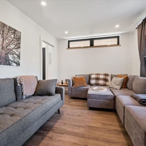 Cozy lounge space perfect for movie nights and relaxing together.