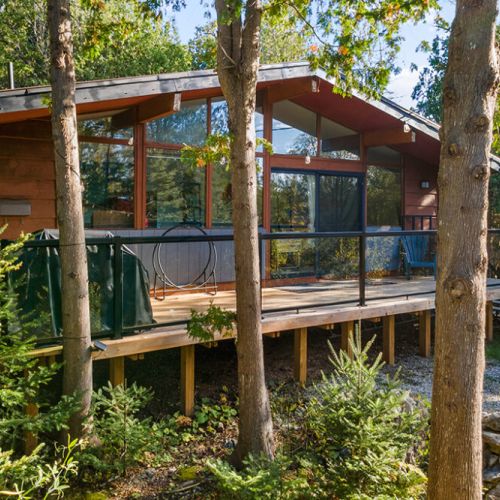 The expansive front deck is the perfect place to enjoy morning coffee or relax after a day exploring the Bruce Peninsula.