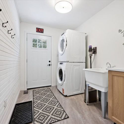 Convenient mudroom with main-level laundry, ideal after beach days, hikes, or outdoor adventures.