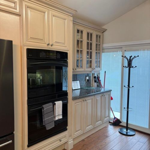 A well-appointed kitchen with built-in oven, granite counters, and ample storage. Ideal for extended stays and comfortable vacation cooking.