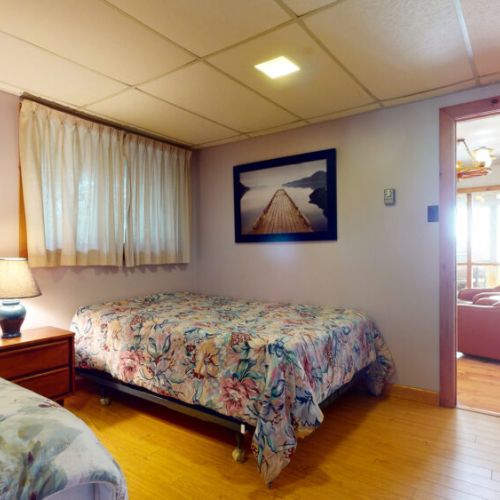 The lower level bedroom has access right to the lower living space.