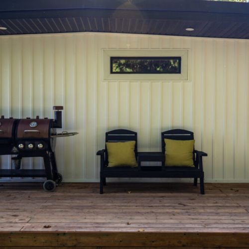 Close up of the deck seating so you can relax outside in the shade anytime.