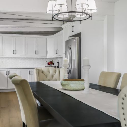 Fresh modern kitchen and dining view with plenty of room for big breakfasts and dinners.