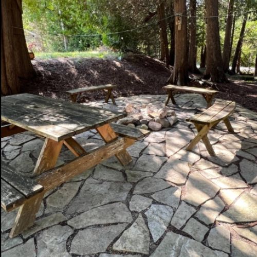 Enjoy evenings by the fire pit under a canopy of trees. Share stories, toast marshmallows, and listen to the whispering breeze through the cedars.