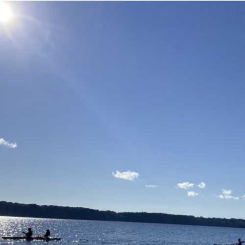 Soak in the endless blue of Colpoy's Bay under the sun with direct water access from the back of the property.
