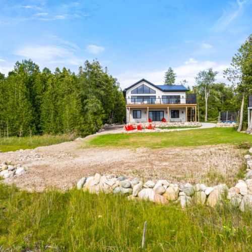 Enjoy a peaceful waterfront escape with plenty of space to relax, play, and gather outdoors.